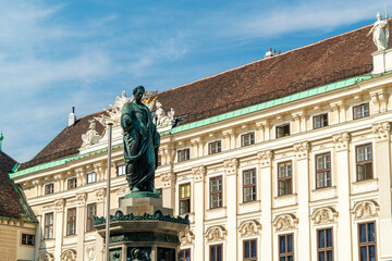 Fototapeta na wymiar Hofburg and statue of Emperor Franz Joseph I, Vienna