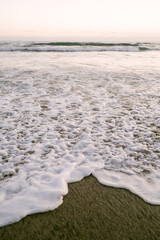 Foamy wave at California beach