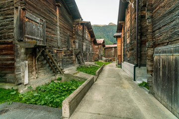 Fototapeta na wymiar Historic village with wooden houses in Valais, switzerland
