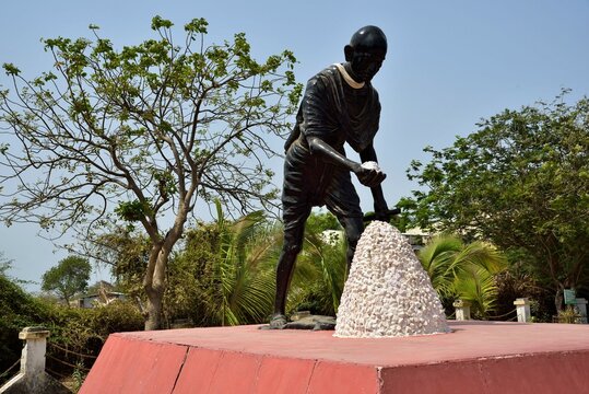 Statue of Mahatma Gandhi collecting salt, Dandi, Navsari, Gujarat, India, Asia
