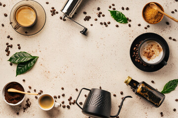 Background with cups of coffee and ingredients on light beige background. Copy space. Top view