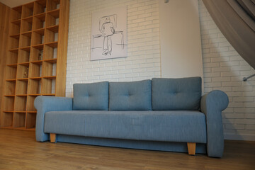 A beautiful, soft sofa in a room with white walls