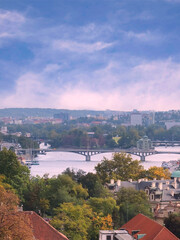 Fototapeta na wymiar Beautiful city view with river and bridge in daytime