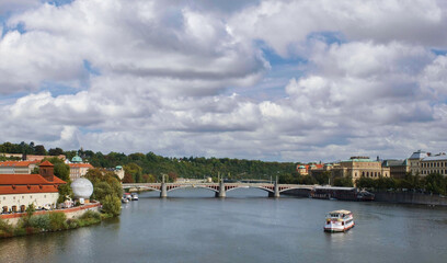 Scenic view of bridge across the river and boat