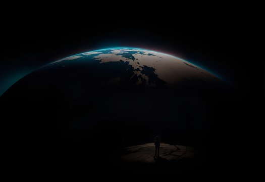 Photo of a man standing in front of the earth