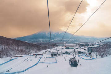 Beautiful Yotei Mountain with Snow in winter season at Niseko. landmark and popular for Ski and Snowboarding tourists attractions in Hokkaido, Japan. - obrazy, fototapety, plakaty