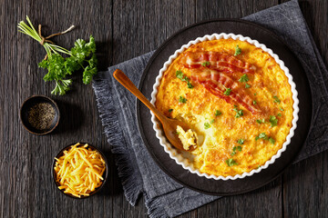 Cheddar Cheese Grits Casserole with bacon slices
