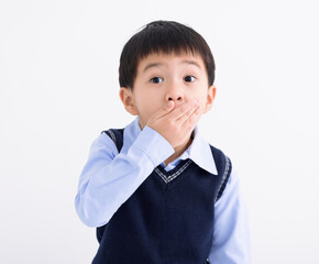 Little boy kid  shocked and hand covering mouth  for mistake