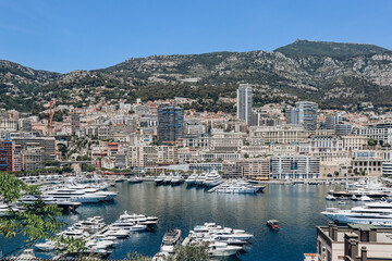 Fototapeta na wymiar Monaco, Monaco - 25 June 2023: View of Port Hercule in Monaco on a sunny day