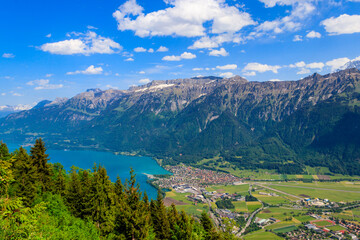 Fototapeta na wymiar Breathtaking aerial view of Interlaken, Lake Brienz and Swiss Alps from Harder Kulm viewpoint, Switzerland