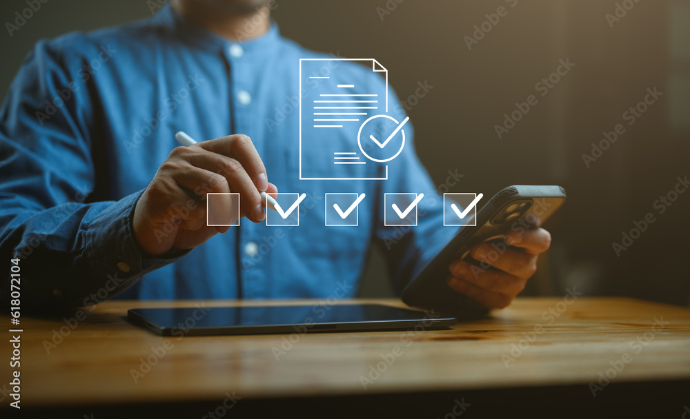 Poster check mark symbol represents the standard quality control. businessman writing virtual glowing corre