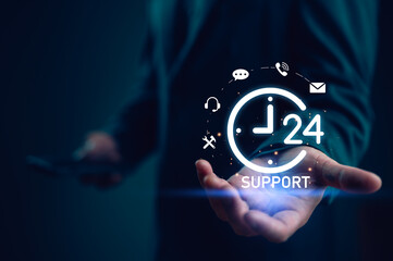 Businessman holding icon virtual 24 support services, worldwide nonstop and full-time available contact of service concept. Assistance customer services, Care and consulting client 24hr, Call Center.