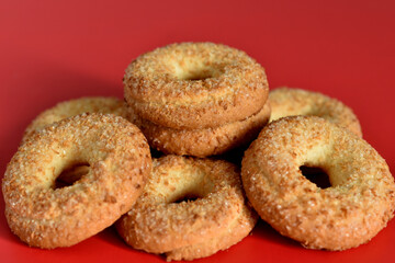 Shortbread cookies lie on a red background.