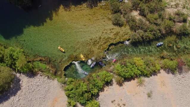 Top down shot kayak goes down small waterfall at zrmanja river Croatia, aerial
