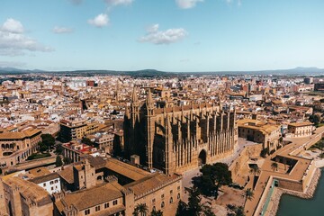 Aerial view of the Cathedral of Santa Maria in Palma de Mallorca, Spain © Kasper Garam/Wirestock Creators