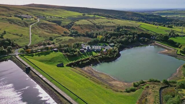 Cinematic, aerial clip of Ogden Reservoir, Oldham, on the edge of the Pennines.