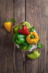 fresh green sweet (capsicum) pepper. Bell pepper or Capsicum annuum, also called sweet pepper or capsicum. Bell peppers are used in salads and in cooked dishes and are high in vitamin A and vitamin C.