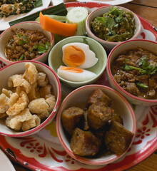 Local food in khantoke. Kind of wooden utensil in Chiang mai northern of Thailand