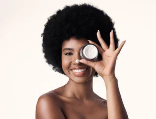 Fotobehang Portrait, black woman with cream and skincare, beauty and natural cosmetics product isolated on white background. Dermatology, afro hairstyle and African female model, lotion and facial moisturizer © HockleyMedia/peopleimages.com