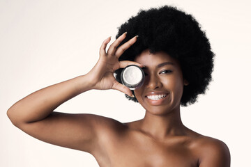 Portrait, black woman with cream and natural beauty, cosmetics product and skincare on white...