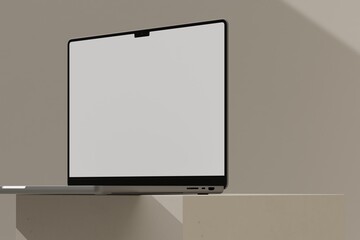 Laptop on beige block