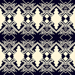 Ethnic motifs mimic natural weaving.