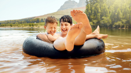 Lake, swimming and mother with child in water while camping in a forest for vacation or holiday...