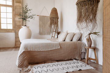 Boho chic style bedroom interior in apartment
