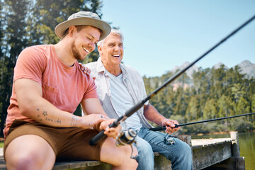 Happy man, father and fishing in lake for fun bonding, hobby or relaxing together in the nature...