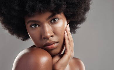 Black woman, portrait and skin, natural beauty and afro hair with glow isolated on studio...