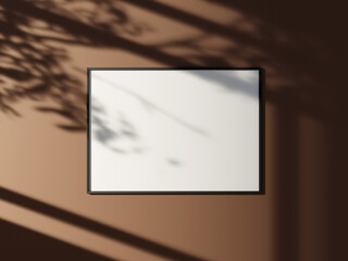Minimal picture poster frame mockup on the wall with window shadow and leaves