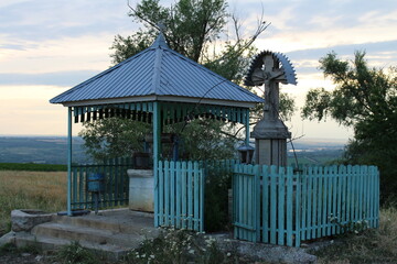 A blue gazebo in a park