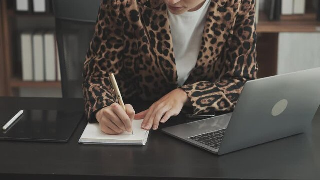 Young business woman lawyer works in office, bookkeeping, audit, stock split, accounting valuation, business combination, marginal deposit, trade account payable, hire purchase, balance sheet account