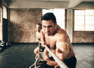 Men, gym and pull rope with training for strong muscle, coaching or teamwork for health, fitness...