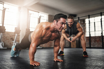 Fitness, coach and male athlete doing push up exercise for strength, health and wellness. Sports,...