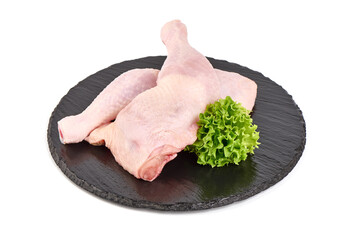 Raw chicken leg quarters, isolated on white background. High resolution image.