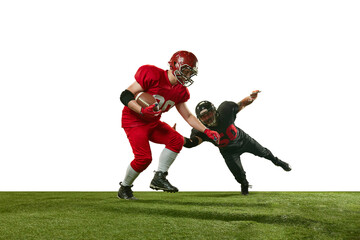Fototapeta na wymiar Dynamic image of two men in uniform american football players in motions on field during tense game over white background. Concept of professional sport, action, lifestyle, competition, training, ad