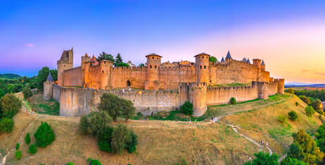Medieval castle town of Carcassone at sunset, France - obrazy, fototapety, plakaty