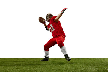 Fototapeta premium Man in red uniform and helmet, american football player in motion during game, serving ball against white background. Concept of professional sport, action, lifestyle, competition, hobby, training, ad
