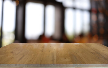 Empty wood table top and blur of out door garden background Empty wooden table space for text marketing promotion. blank wood table copy space for background