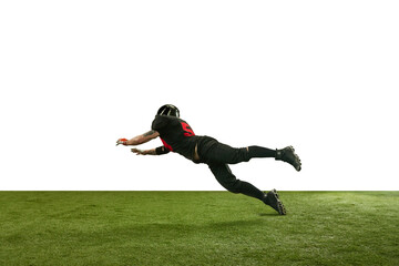 Dynamic image of man in black uniform and helmet, american football player in motion during game...