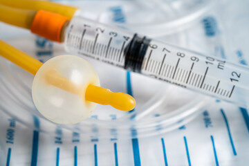 Foley urinary catheter with urine bag for disability or patient in hospital.