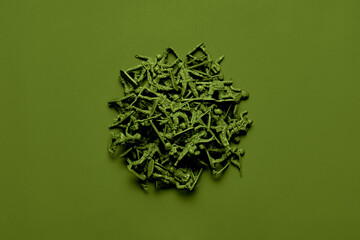 Monochromatic Color Pile of Toy Soldiers on Fabric