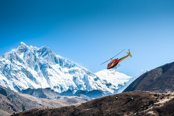 Tourist helicopter in Himalaya mountains, Nepal..