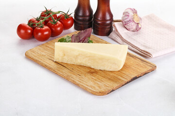 Piece Italian hard parmesan cheese