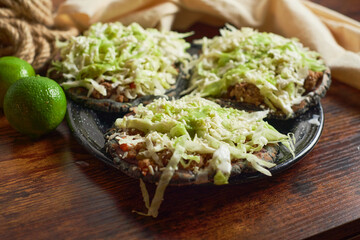 Mexican sopes with green sauce, Traditional food in Mexico