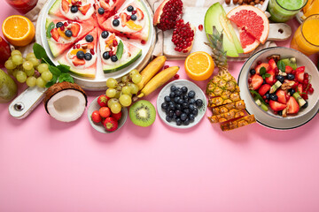 Summer fruits assorted on white background. Fresh raw food concept.