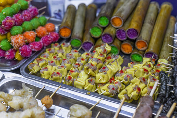 Many snacks and seafood in vietnamese night market in food festival