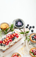 Dessert table. Top view, Summer cake with berries. Healthy dessert concept.