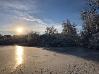 frozen lake with snow in winter